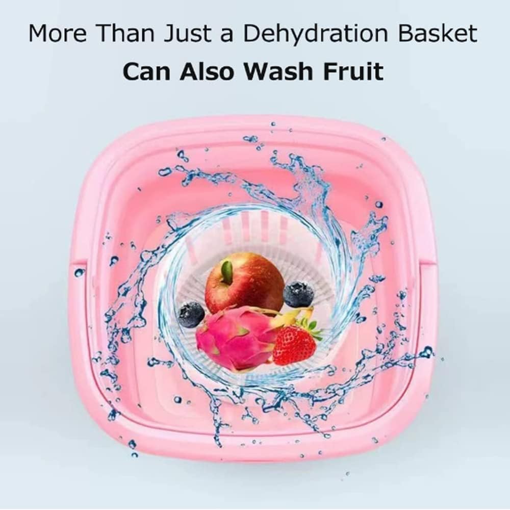 Pink fruit washing basket with fruits and water splashes on a light blue background