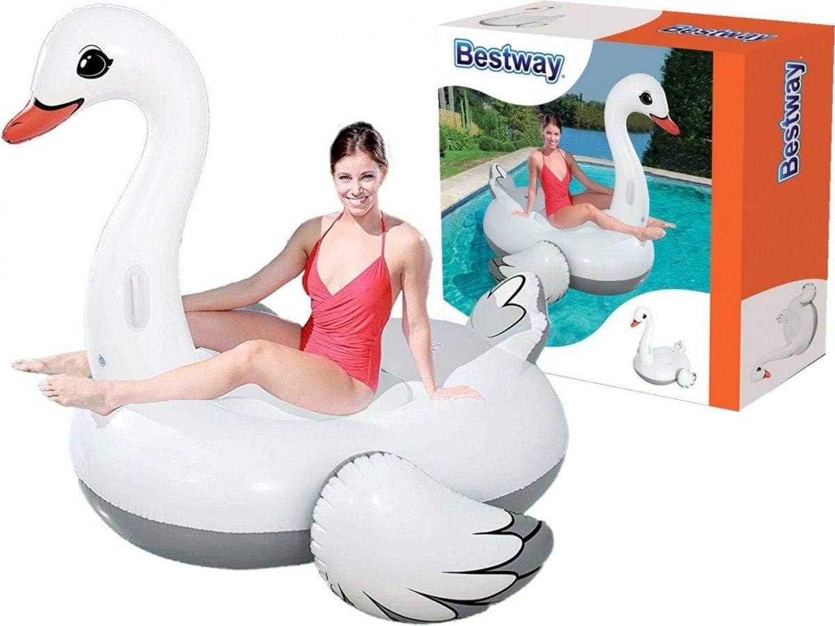 Inflatable swan pool float with a person sitting on it, next to its packaging.