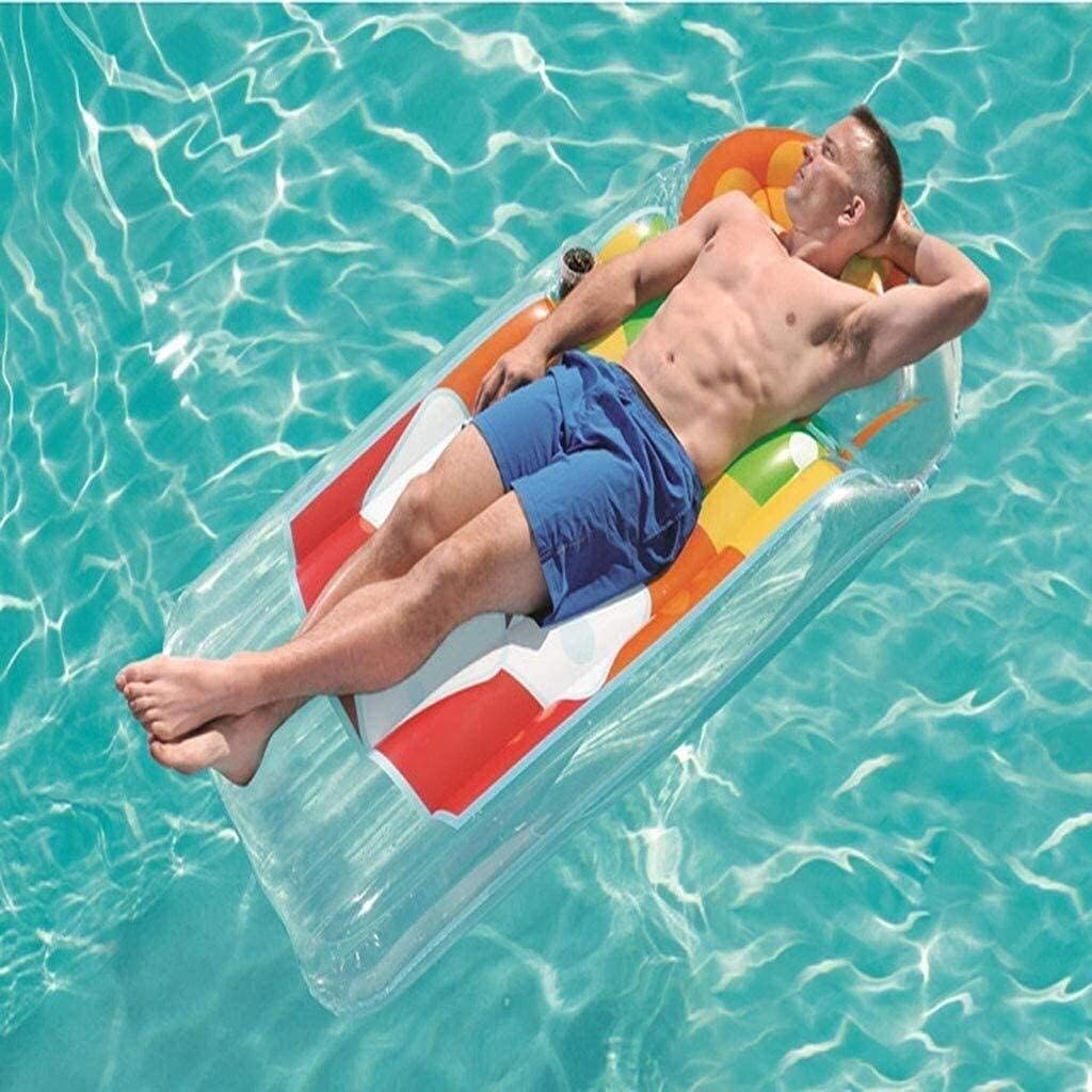 Man lying on a colorful inflatable pool float in clear blue water