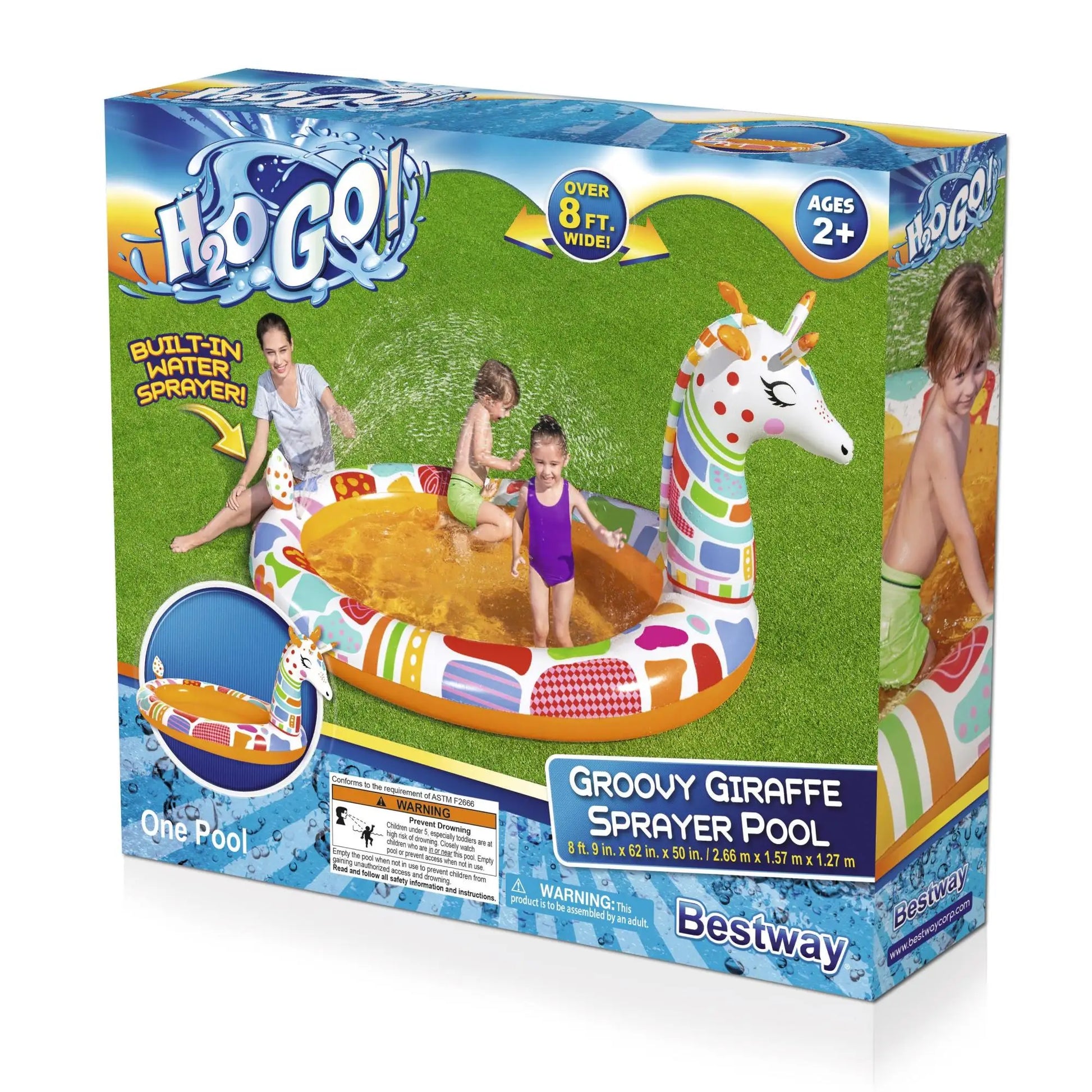 Box of Groovy Giraffe Sprayer Pool with children playing around it on a grassy background